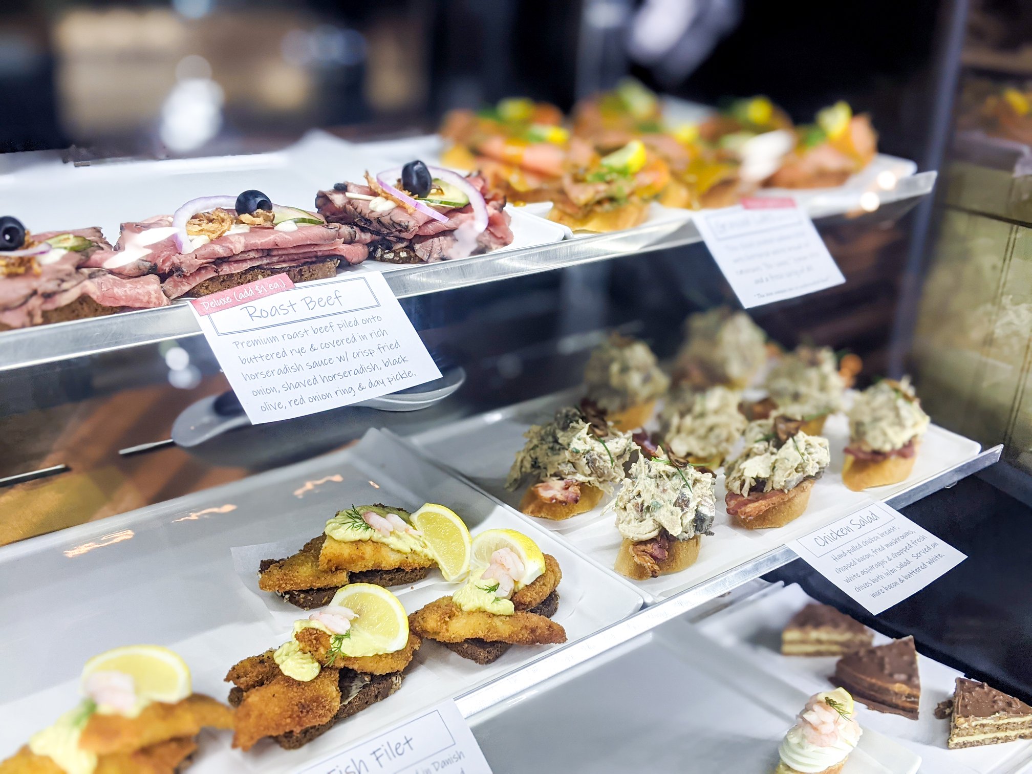 247311649_10151743906254984_576768612851797044_n nord Scandinavian Food & Hygge</p>
<p>Offering the authentic Scandinavian food you’ve probably never had, but won’t want to live without once you do. Be sure to try their almost too-pretty-to-eat open-faced “smørrebrød” sandwiches, imported danishes straight from Denmark, and other hygge offerings. And don’t think of leaving Market without grabbing arguably one of the best hot dogs you’ll ever eat, the loaded artisanal Nord Dog!